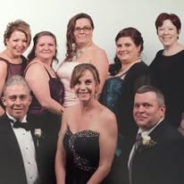 Hearts with Hope members in formal attire at a special event