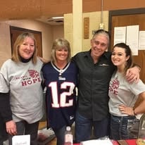 Four Hearts with Hope members together at an event